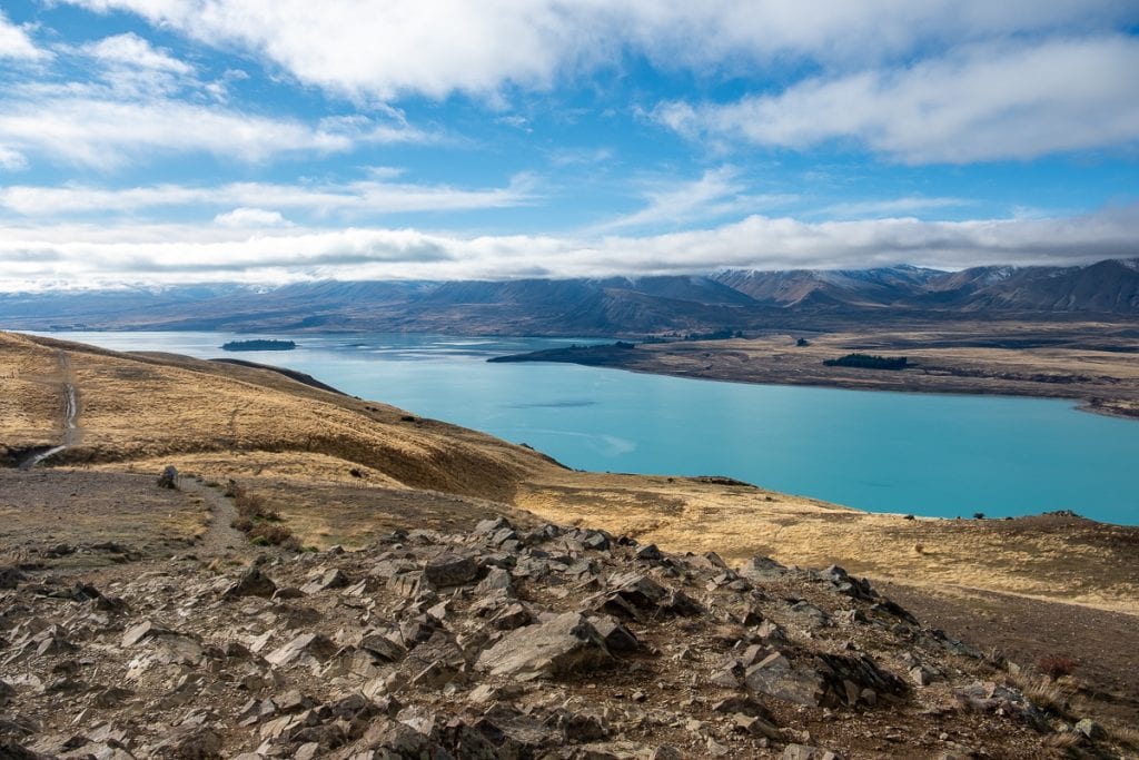 Lake tekapo is one of my favourite destinations to visit while travelling New Zealand in a campervan. This photo is looking down on the stunning lake! 