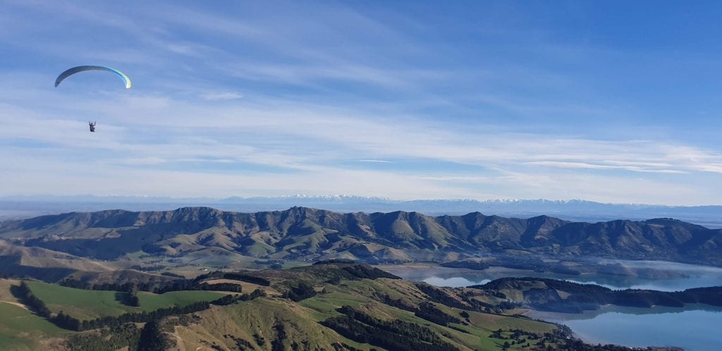 A photo of my brother paragliding in Banks peninsular in the Canterbury region New Zealand 