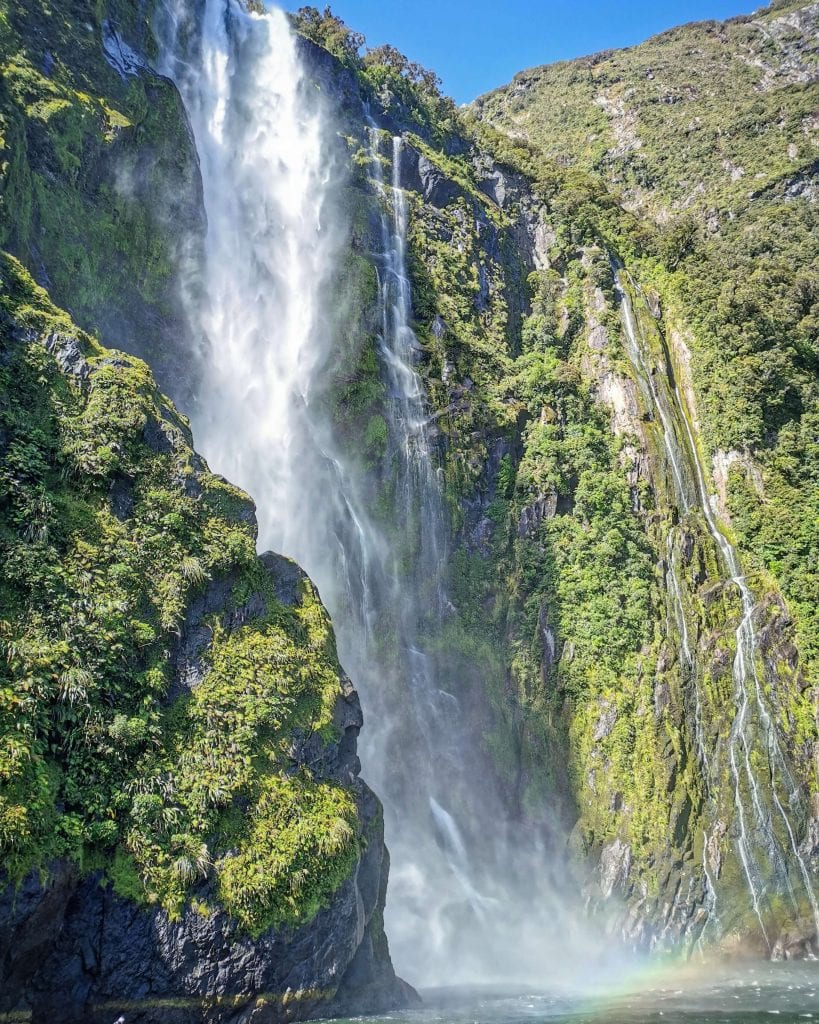 a stunning photo of a milford sound waterfall one of the best things to do in Southland 